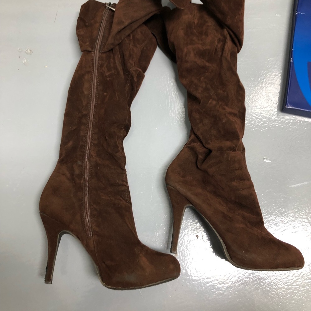 Worn used brown boots